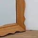 scalloped frame mirror